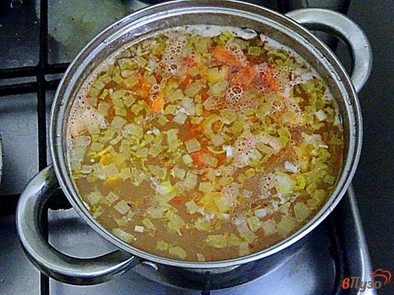 Фото приготовление рецепта: Суп с рисом картофелем и овощами шаг №5