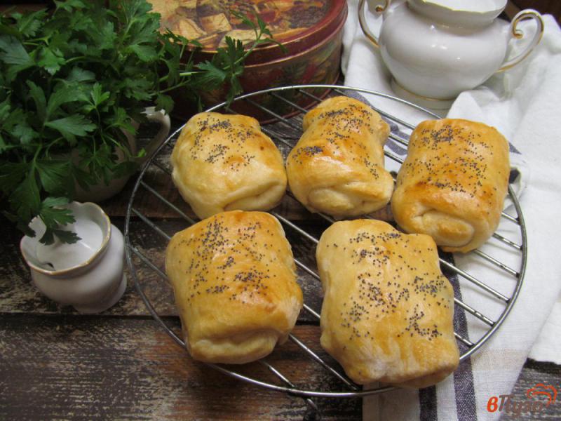 Фото приготовление рецепта: Пирожки на кефире с абрикосом шаг №13