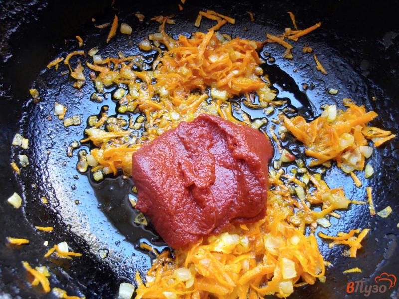 Фото приготовление рецепта: Жаренные кабачки в томатном соусе шаг №8