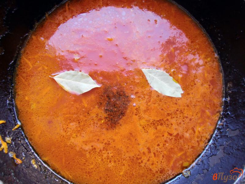 Фото приготовление рецепта: Жаренные кабачки в томатном соусе шаг №9