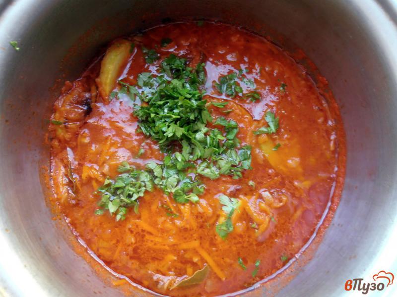 Фото приготовление рецепта: Жаренные кабачки в томатном соусе шаг №11