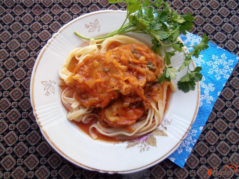 Фото приготовление рецепта: Жаренные кабачки в томатном соусе шаг №12