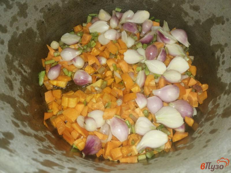 Фото приготовление рецепта: Рагу из кабачков с луком и морковью шаг №6