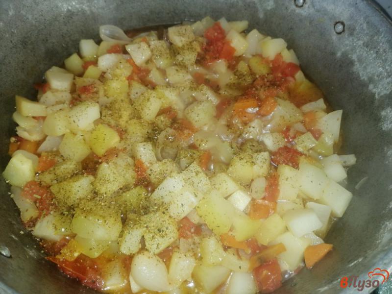 Фото приготовление рецепта: Рагу из кабачков с луком и морковью шаг №11