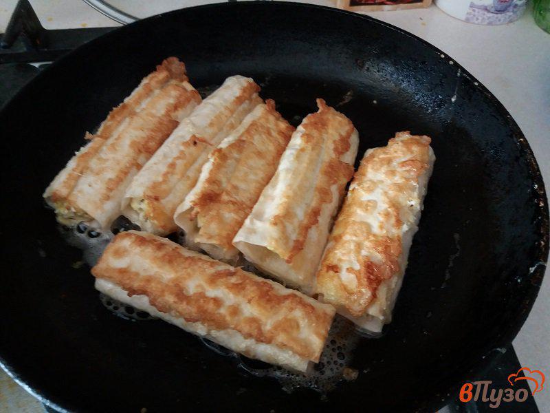 Фото приготовление рецепта: Рулетики из лаваша с сыром шаг №9