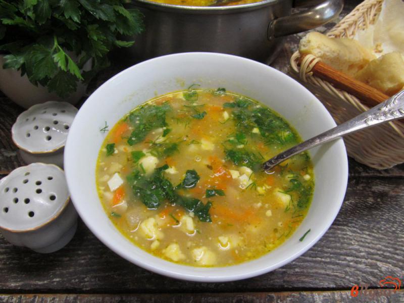 Фото приготовление рецепта: Гороховый суп с яйцами и зеленью шаг №10