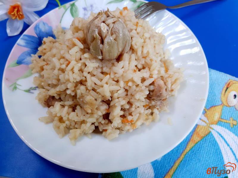 Фото приготовление рецепта: Рис с куркумой и чесноком шаг №9