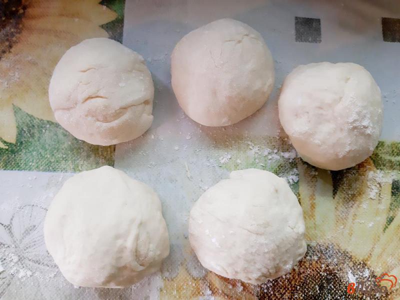 Фото приготовление рецепта: Пирожки с капустой печеные в мультиварке шаг №8