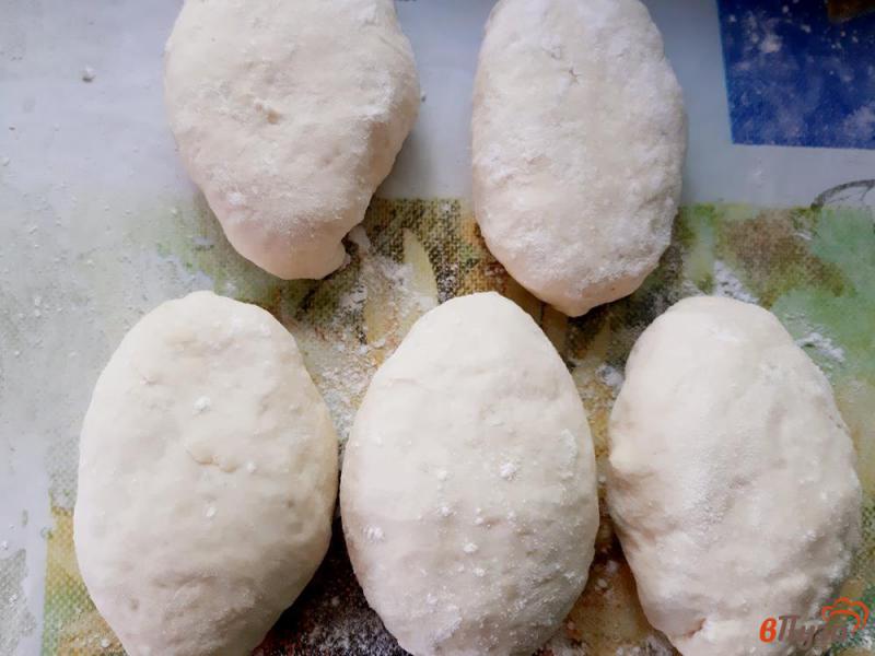 Фото приготовление рецепта: Пирожки с капустой печеные в мультиварке шаг №11