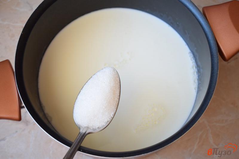 Фото приготовление рецепта: Рисовая каша на молоке с малиной шаг №2