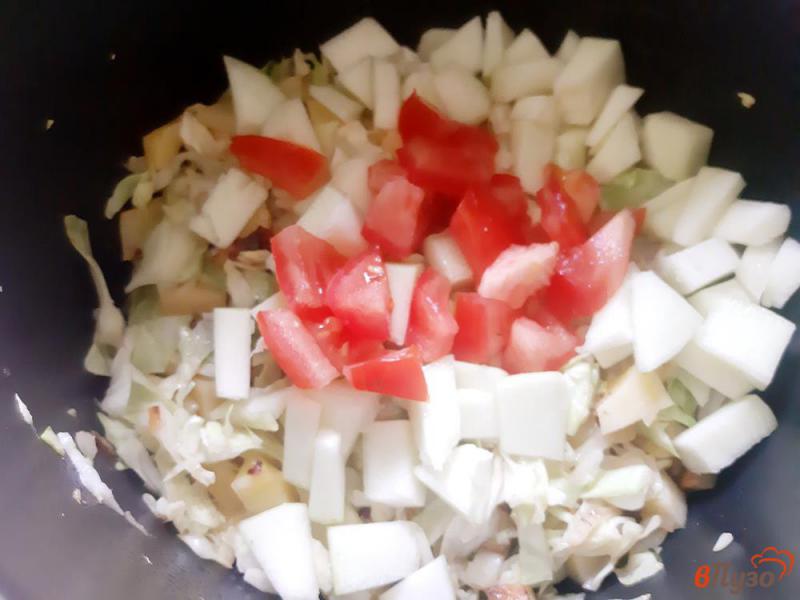 Фото приготовление рецепта: Рагу из кабачков с капустой и помидорами шаг №11
