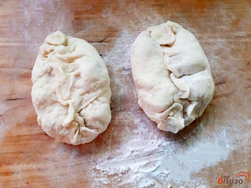 Фото приготовление рецепта: Пирожки жареные дрожжевые с вишнями шаг №7