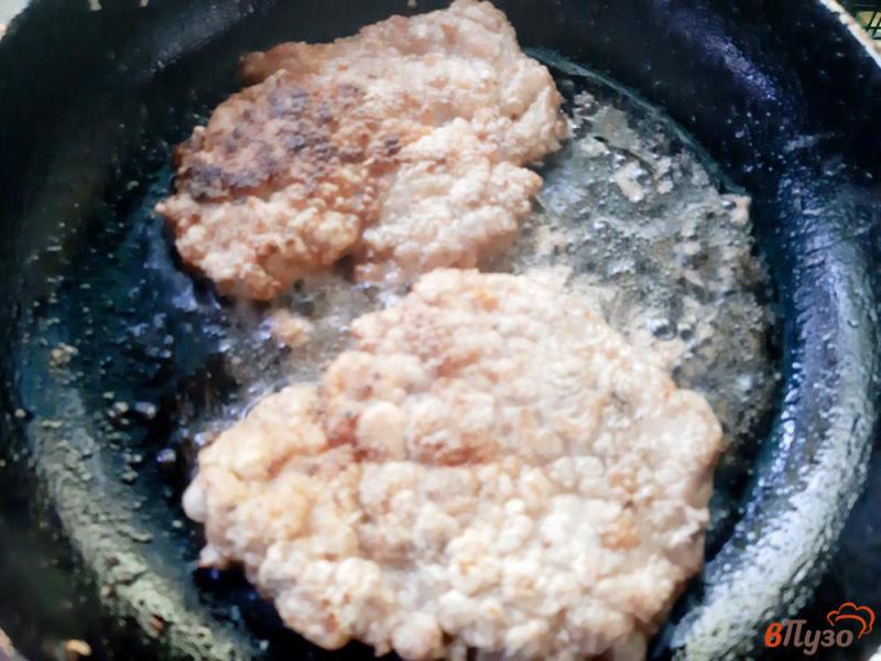 Фото приготовление рецепта: Отбивные из свинины в маринаде с дижонской горчицей шаг №7