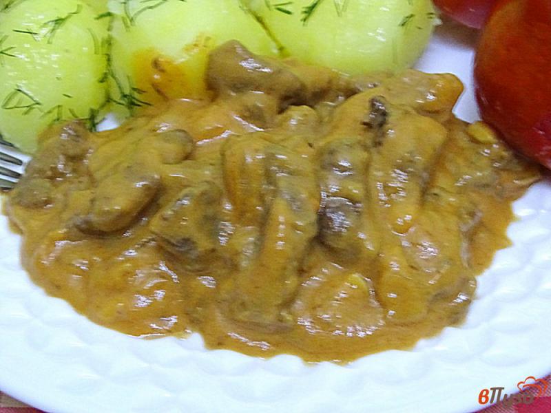 Фото приготовление рецепта: Говядина в сливочно-томатном соусе шаг №10