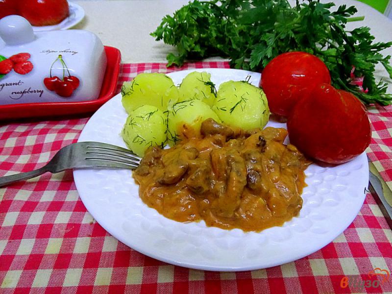 Фото приготовление рецепта: Говядина в сливочно-томатном соусе шаг №11