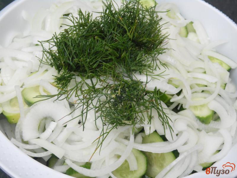 Фото приготовление рецепта: Салат на зиму из огурцов и репчатого лука шаг №4
