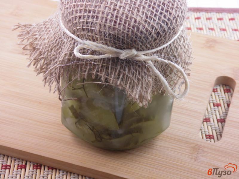 Фото приготовление рецепта: Салат на зиму из огурцов и репчатого лука шаг №9