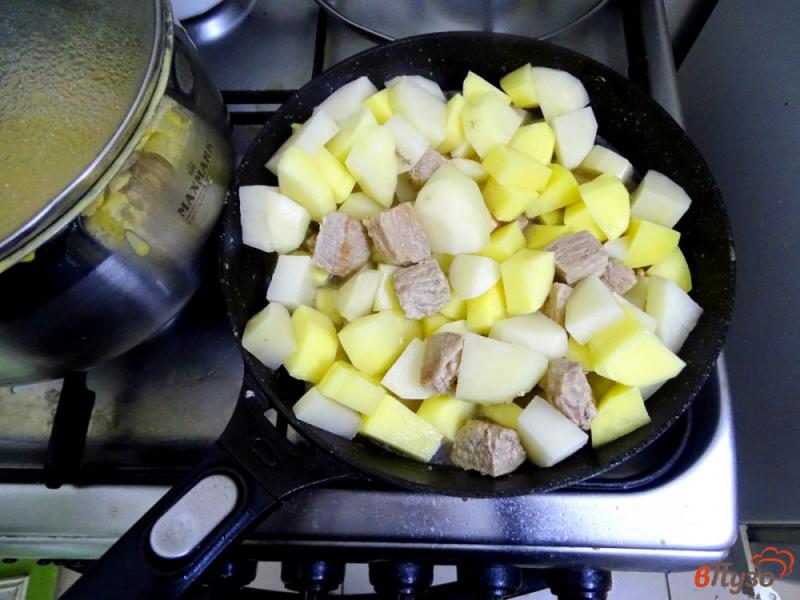 Фото приготовление рецепта: Жаркое со свининой баклажанами и перцем шаг №8