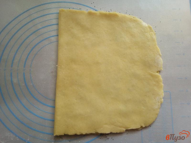 Фото приготовление рецепта: Слоёное песочное печенье с маком шаг №9