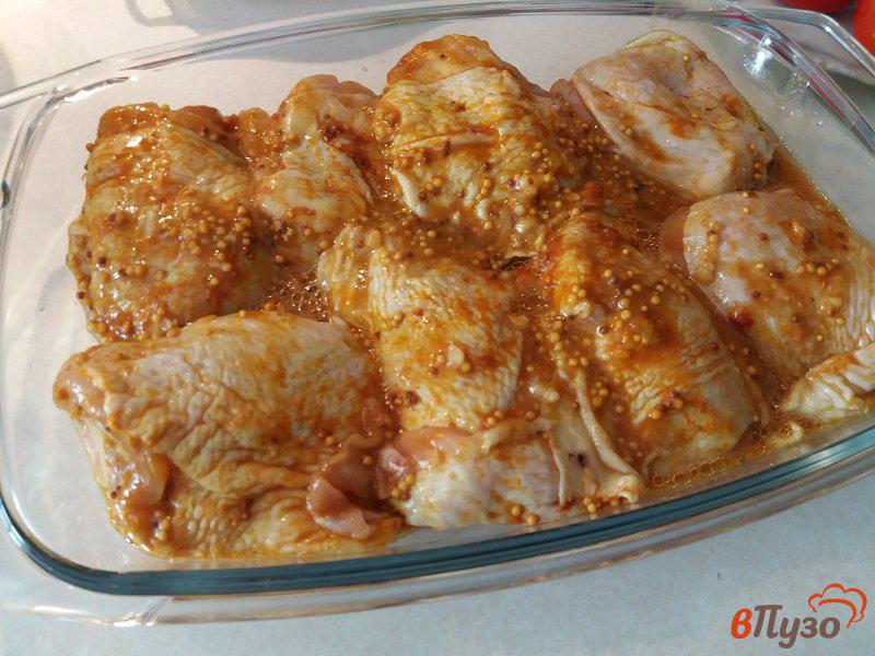 Фото приготовление рецепта: Запеченные куриные бедрышки в пикантном  маринаде шаг №4