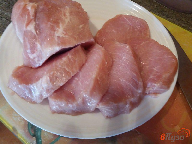 Фото приготовление рецепта: Запеченные отбивные из свинины в прованских травах шаг №2
