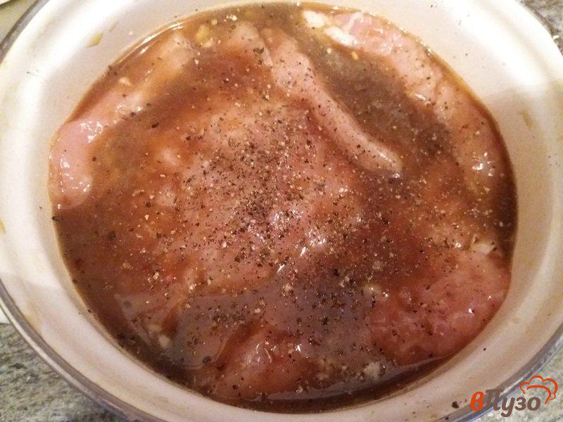 Фото приготовление рецепта: Запеченные отбивные из свинины в прованских травах шаг №7
