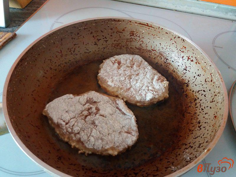 Фото приготовление рецепта: Запеченные отбивные из свинины в прованских травах шаг №10