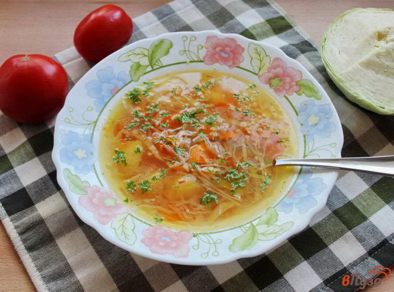Фото приготовление рецепта: Овощной суп с помидорами и рисом шаг №7