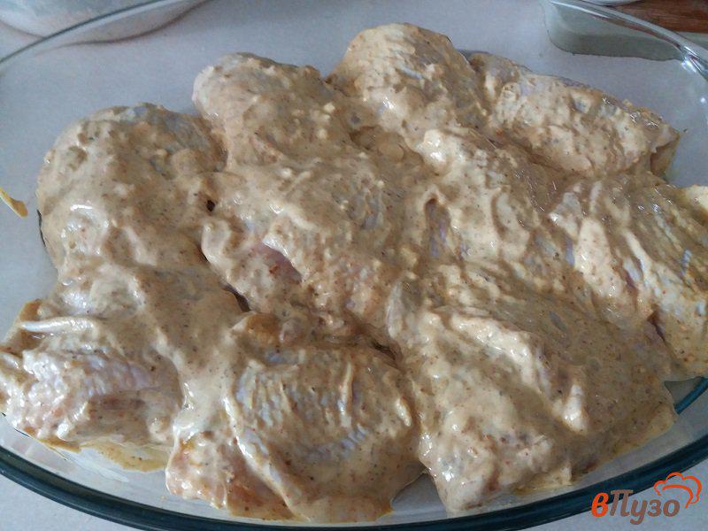 Фото приготовление рецепта: Куриные бедра в чесночном маринаде шаг №6