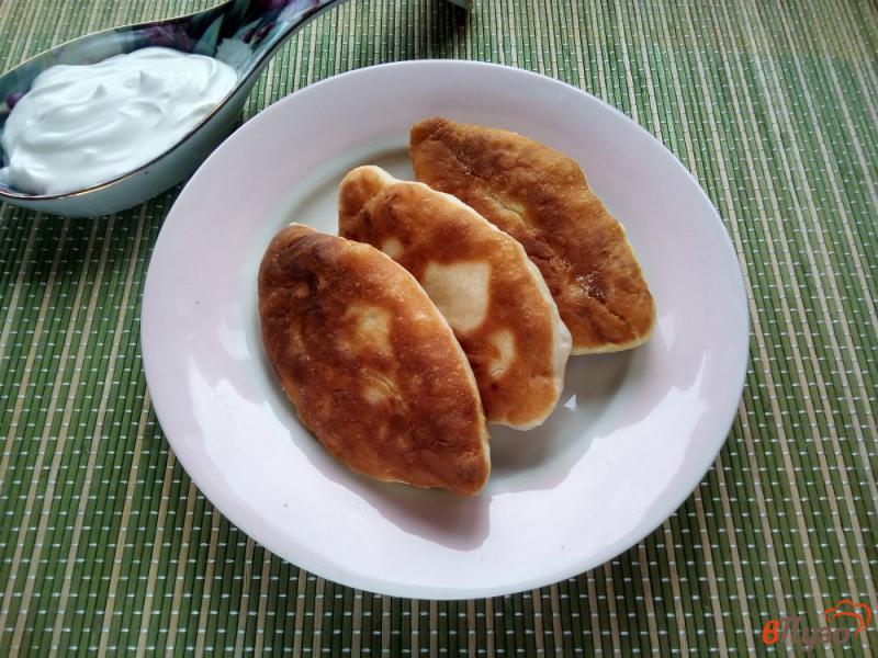 Фото приготовление рецепта: Пирожки с картофелем на кефирном тесте шаг №10