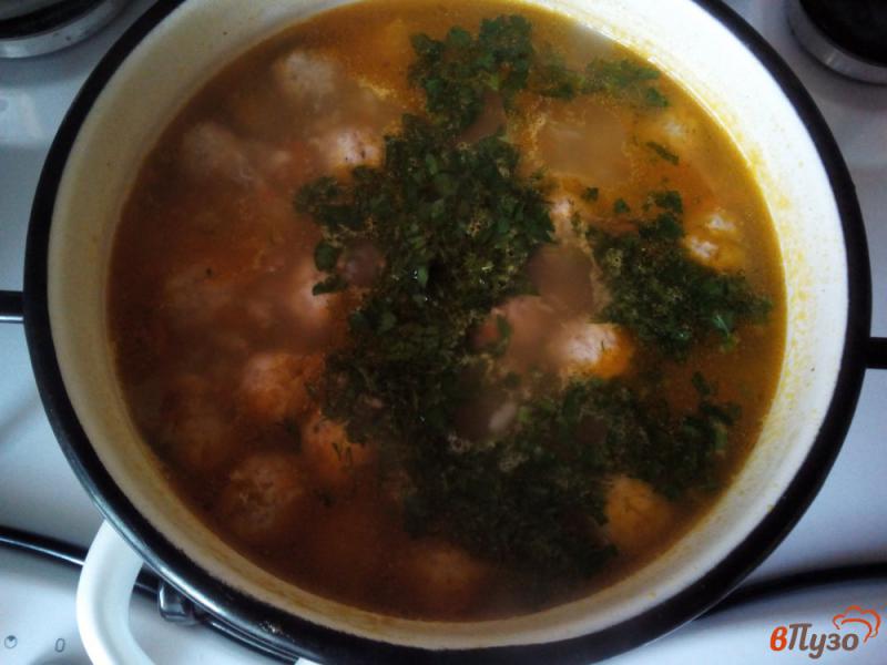 Фото приготовление рецепта: Суп с рисом и фрикадельками шаг №7