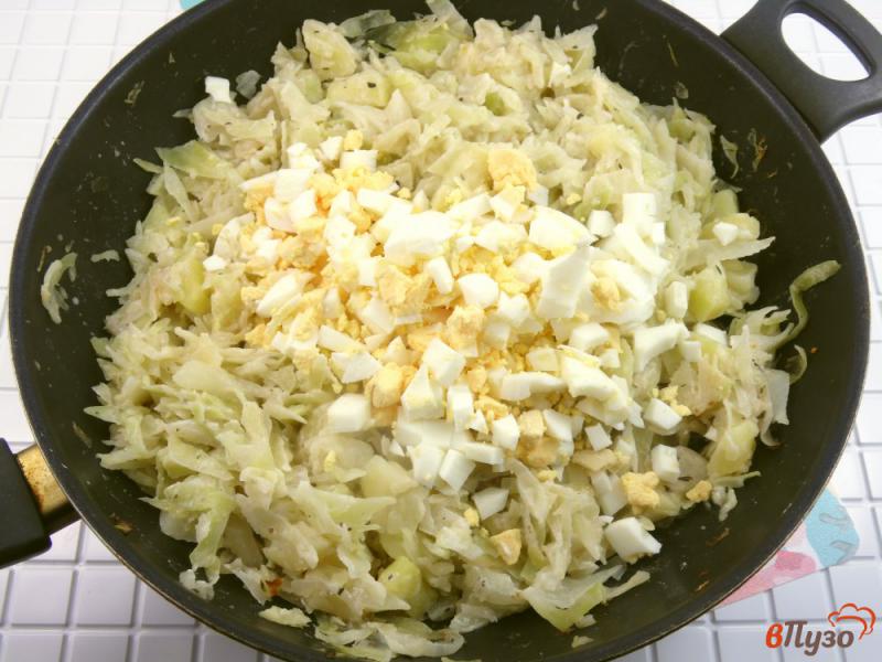 Фото приготовление рецепта: Рагу из капусты и картофеля в сливках шаг №6