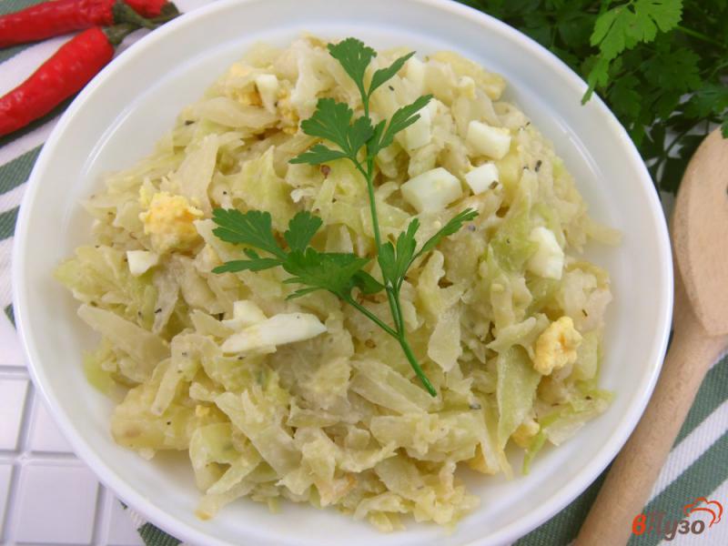 Фото приготовление рецепта: Рагу из капусты и картофеля в сливках шаг №7