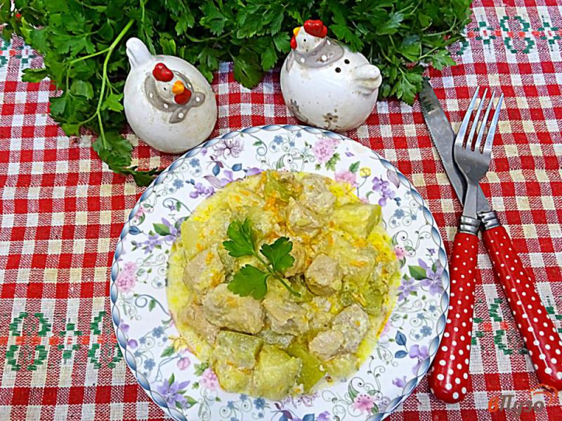 Фото приготовление рецепта: Свинина с кабачками в сметанном соусе шаг №12