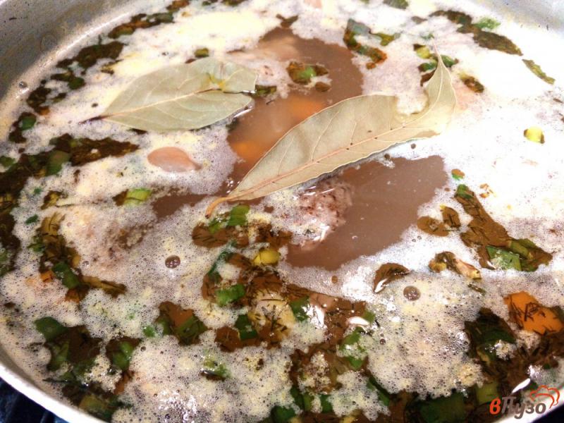Фото приготовление рецепта: Овощной суп с фасолью и тушенкой шаг №7