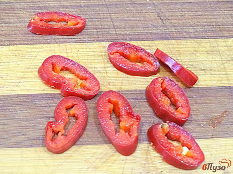 Фото приготовление рецепта: Куриные желудки в остром томатном соусе шаг №7
