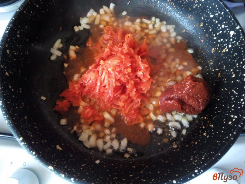Фото приготовление рецепта: Тефтели с булгуром в томатном соусе шаг №8