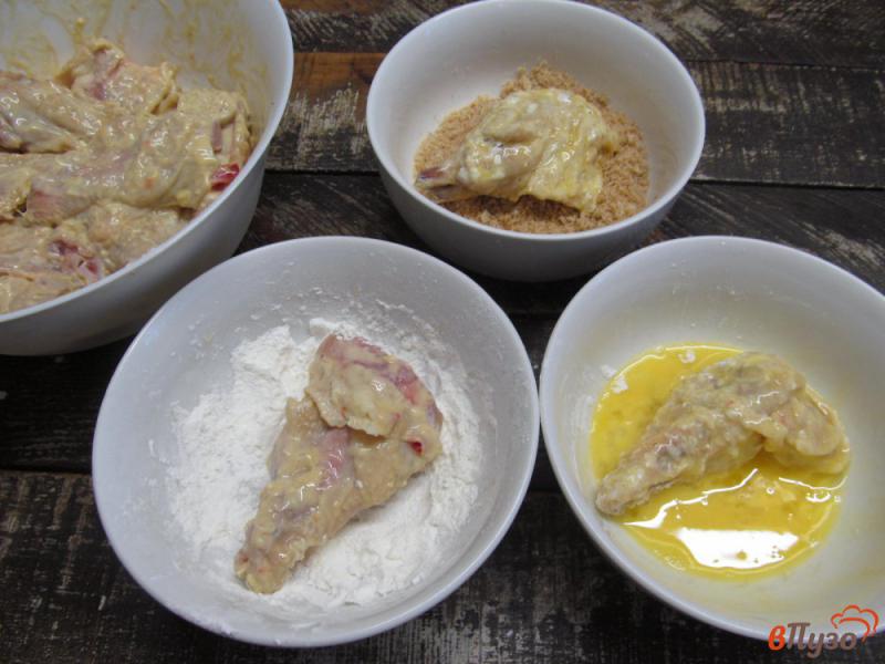 Фото приготовление рецепта: Остро-сладкие куриные крылья шаг №5