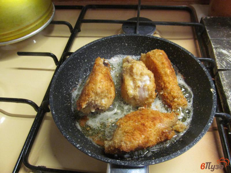Фото приготовление рецепта: Остро-сладкие куриные крылья шаг №7