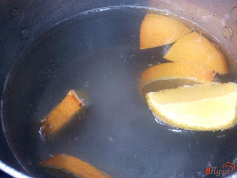 Фото приготовление рецепта: Виноградно-апельсиновый компот шаг №3