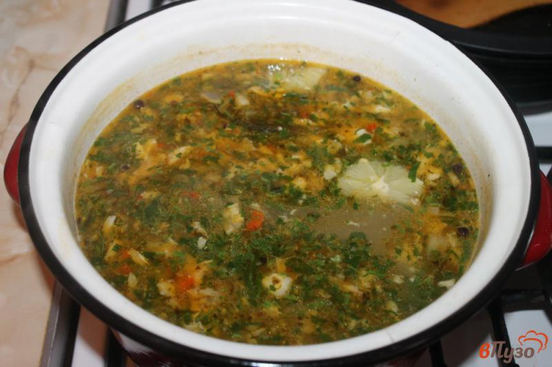 Фото приготовление рецепта: Рыбный суп с лимоном и болгарским перцем шаг №5