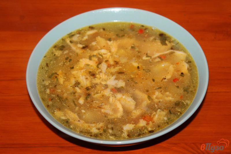 Фото приготовление рецепта: Рыбный суп с лимоном и болгарским перцем шаг №6
