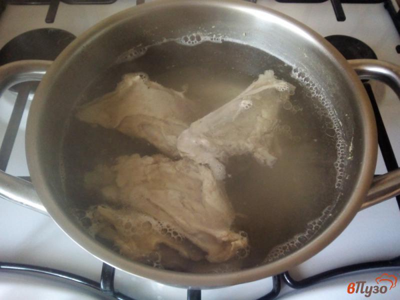 Фото приготовление рецепта: Суп из кролика шаг №2