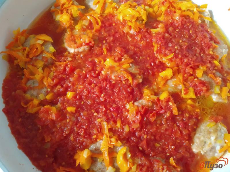 Фото приготовление рецепта: Фрикадельки в томатном соусе шаг №13