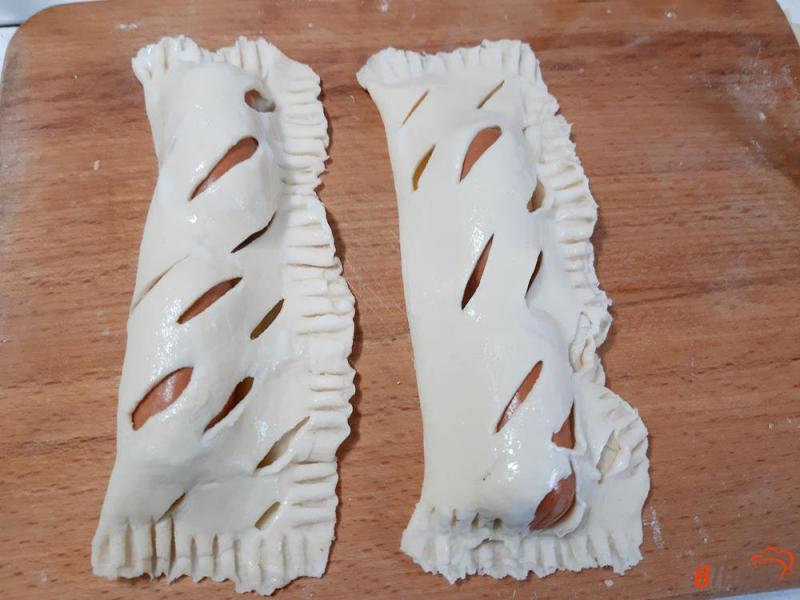 Фото приготовление рецепта: Сосиски в тесте с сырными палочками шаг №5