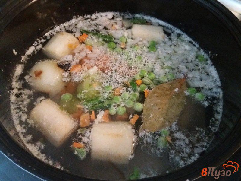 Фото приготовление рецепта: Куриный суп с овощами и овсяными хлопьями шаг №3