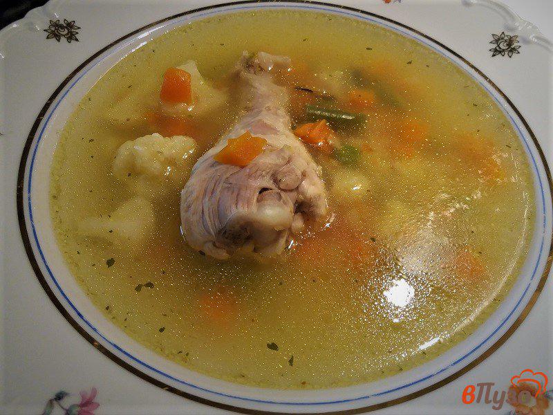 Фото приготовление рецепта: Куриный суп с овощами и овсяными хлопьями шаг №7
