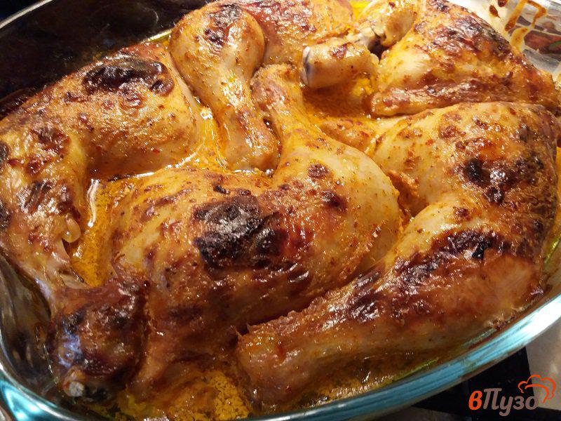 Фото приготовление рецепта: Запеченные куриные окорочка в аджике шаг №7