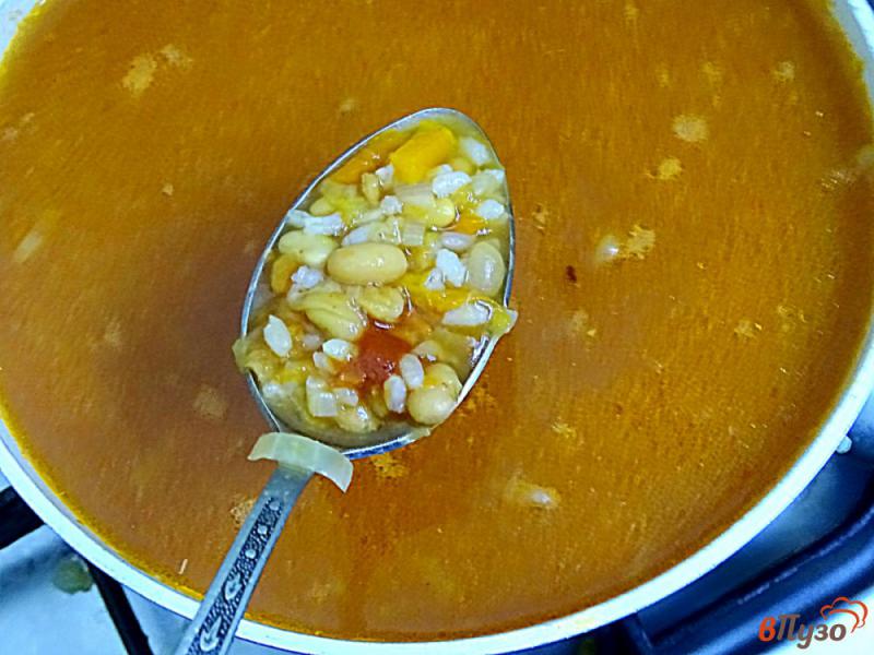 Фото приготовление рецепта: Острый фасолевый суп с рисом шаг №8
