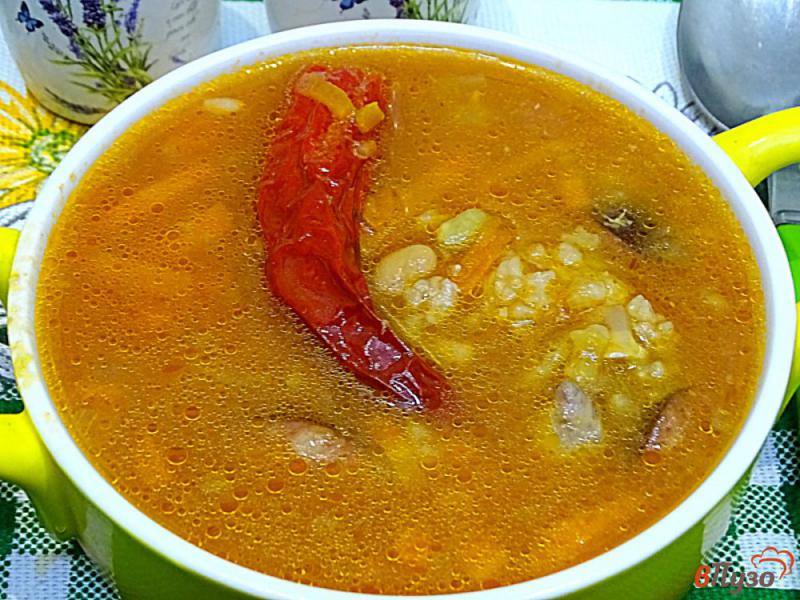 Фото приготовление рецепта: Острый фасолевый суп с рисом шаг №9